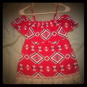 A off the shoulder printed shirt.